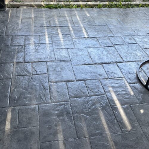 Stamped concrete flooring in outdoor areas